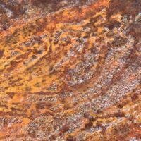 Oftentimes after rust dyeing, there are imprints of yarn left on the metal itself.