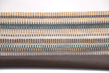 Reflection, 2020, Cotton, rusted steel Close up of handwoven fabric.